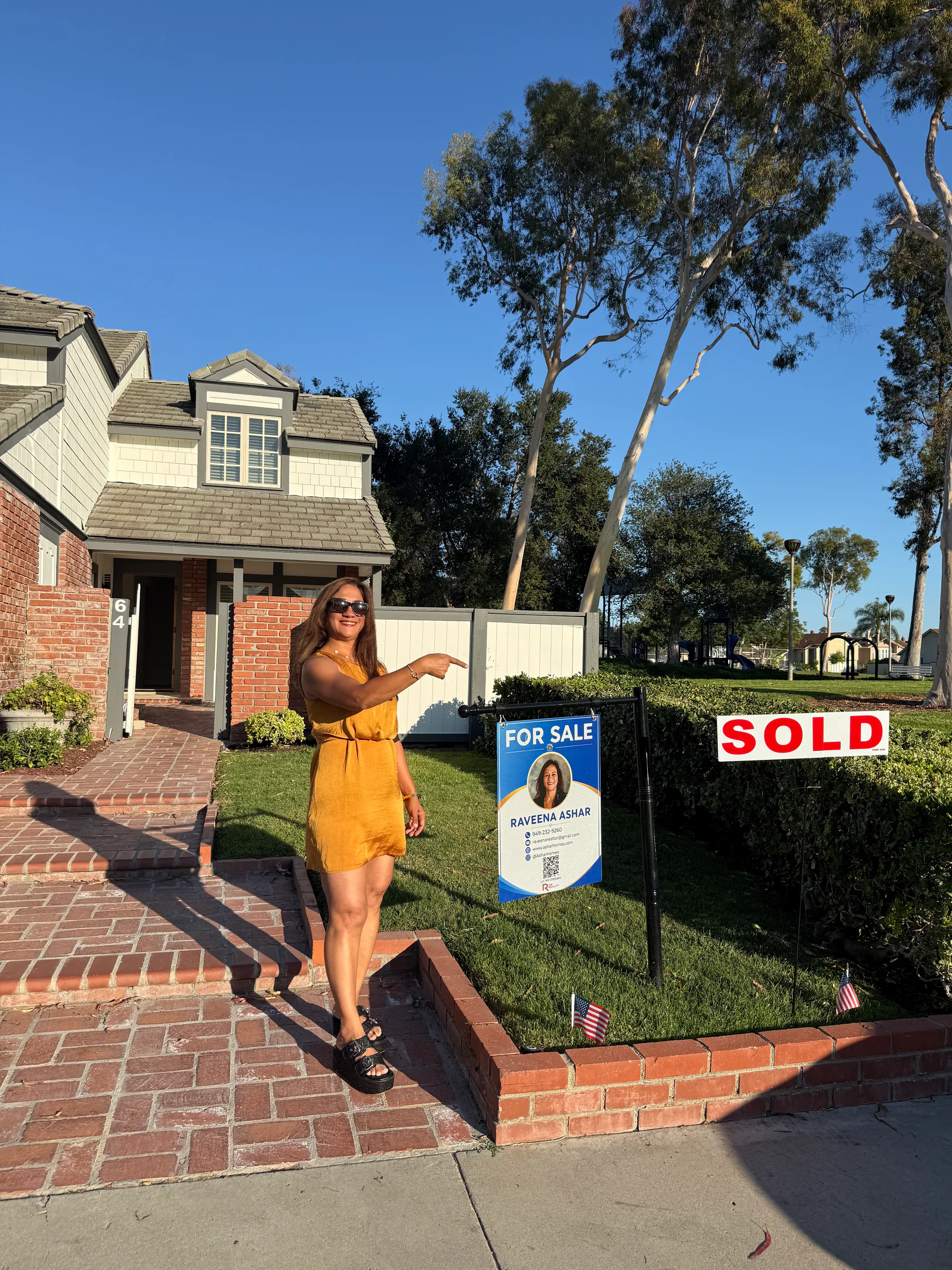 Raveena Ashar at 64 Bennington in Irvine with the sold sign